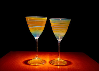 Pair of unique hand made carnival glass goblets