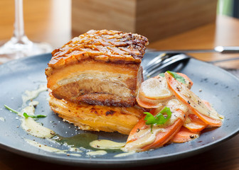 Roasted pork belly meat served in a restaurant