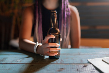 Concept: girl drinking a beer