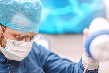 male surgeon doctor in a medical office at work