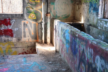Abstract view inside an abandoned building with graffiti