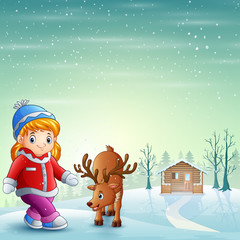 Little girl with deer on the snowy village