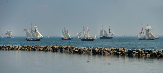 Tall Ships with sails up in the Toronto Harbour on Lake Ontario