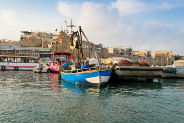 Fototapeta premium Port of Akko (Acre) with boats, mosque and the old city in the background, Israel.