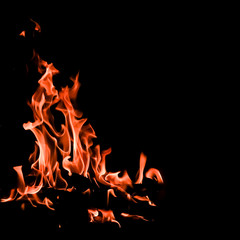 Flames of fire on a black background. The mystery of fire.