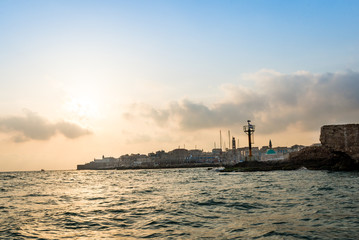 Naklejka premium View of the fortification of the old city Akko from boat. Israel.