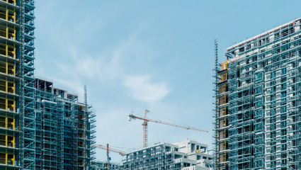 Facades of modern skyscrapers built in city.
