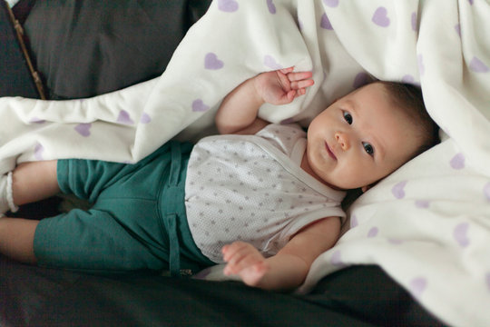 baby portrait on the bed