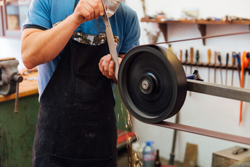 Skillful knife maker