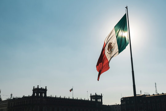 Mexican flag blowing by wind