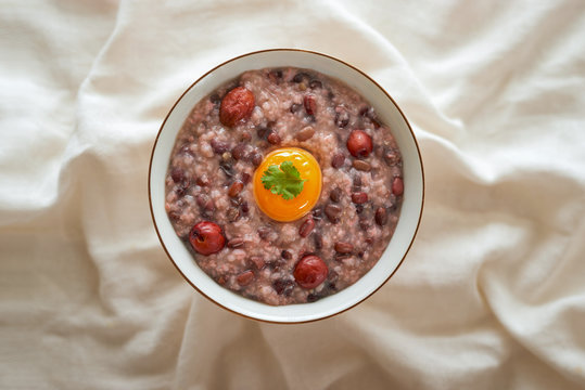 Red bean congee in a bowl.