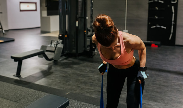 Athlete Woman In The Gym