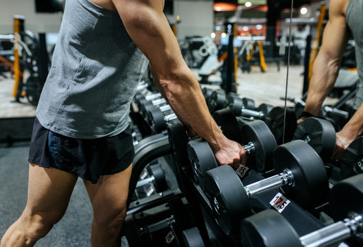 Middle-aged man training in the gym