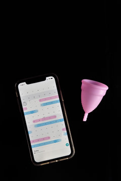 Menstrual cup with fertility tracker app