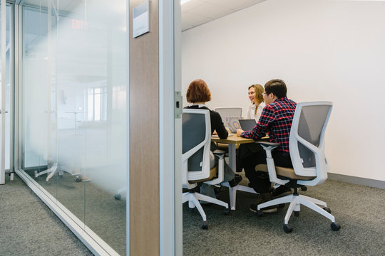 Casual Business Meeting in Conference Room