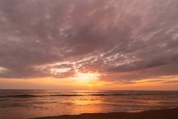 Fototapeta premium Beautiful sunset at seascape. Beach area in front of Ban Ta Nuak School Khlong Yai Subdistrict, Khlong Yai District, Hong Kong, Trat, Thailand 23110