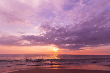 Fototapeta na wymiar Dyeing the image into purple tones. Beautiful sunset at seascape. Beach area in front of Ban Ta Nuak School Khlong Yai Subdistrict, Khlong Yai District, Hong Kong, Trat, Thailand 23110