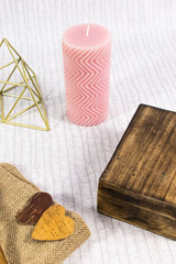 Composition with ceramic heart, wood case, sticks and canvas. Love card, mockup, blank space for text.