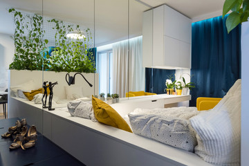 Interior of bedroom in small modern apartment
