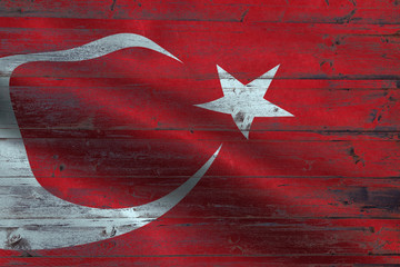 Turkey flag on an old wooden plank forming a background