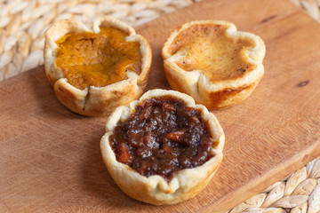 Trio of holiday tarts - pumpkin, mincemeat and butter tart