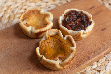 Trio of holiday tarts - pumpkin, mincemeat and butter tart