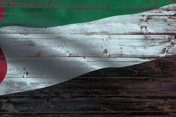 United-arab-emirates flag on an old wooden plank forming a background