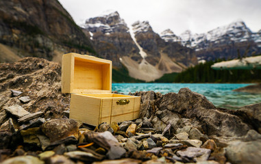 Small Wooden Chest Box Closeup In Epic Mountain Rocky Scene