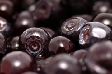 Background of fruits of the blueberries. Fresh food in macro.