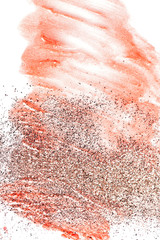 Fototapeta premium Smear of red lipstick with glitter. Cosmetics concept. Element isolated on white.