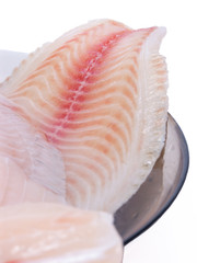 Raw fillets fish. Fresh and healthy food on isolated white background.