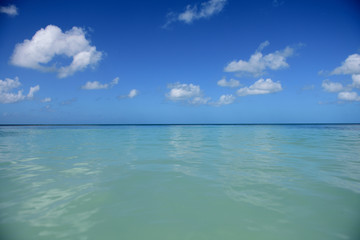 Fototapeta na wymiar Caribbean sea, tropical waters, sky and clouds, Playa Buye, Puerto Rico