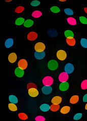 Abstract colorful defocused circular facula holiday bokeh