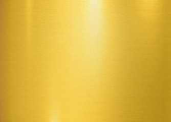 Fototapeta premium metallic rough and noise gold foil texture polished glossy abstract background with copy space, metal gradient template for gold border, frame, ribbon design
