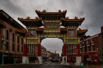 LIVERPOOL, ENGLAND, DECEMBER 27, 2018: View of the enormous chinatown gate in a cloudy and desolated day