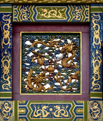 LIVERPOOL, ENGLAND, DECEMBER 27, 2018: Close up of the dragons in the chinatown gate.