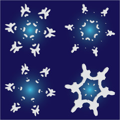 Set of christmas paper snowflakes on blue background.