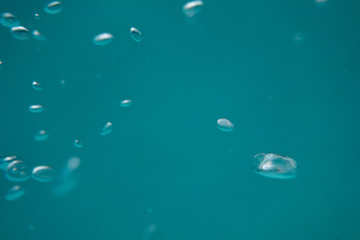 water drops on blue surface