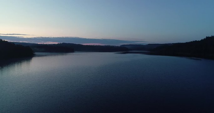 Aerial viev of  peaceful morning dawn, before sunrise over the lake in south Norway. (G&aring;sefl&aring;).