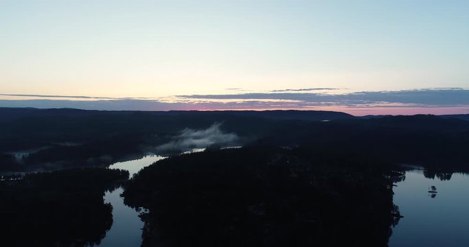 Aerial viev of  peaceful morning dawn, before sunrise over the lake in south Norway. (G&aring;sefl&aring;).