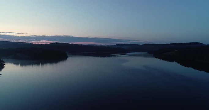 Aerial viev of  peaceful morning dawn, before sunrise over the lake in south Norway. (G&aring;sefl&aring;).
