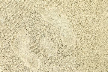 beautiful pattern on the sea sand on nature background