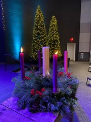 Partially Lit Christmas Advent Wreath in a Church Setting