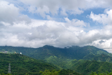 beautiful blue sky high peak mountains mist fog wildlife green forest at Khao Koh, Phu Tub Berk, Phetchabun, Thailand  guiding idea long weekend for backpacker camping campfire relaxing hiking