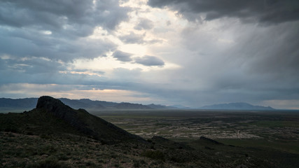 Clouds over the West Desert in Utah at dusk from Table Mountain.