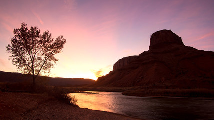 Colorado River during colorful sunset in Castle Valley, Utah.
