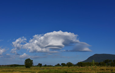 Lenticular Wind Cloud Resembling A Ufo Flying Saucer Over  Mountain In Countryside , Thailand 