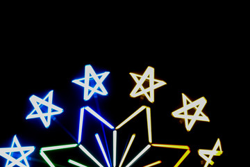 Obraz premium out of focus colour full neon light in dark night.