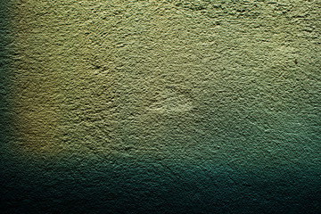 light on the cement wall background in the room