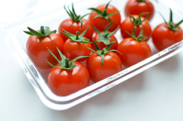 Fresh cherry tomatoes in a plastic pack